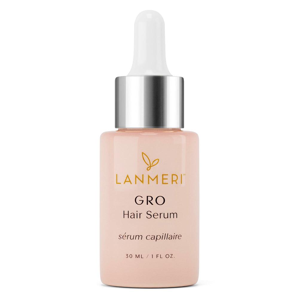 Lanmeri vegan hair growth serum bottle closeup showing vegan formula for healthier hair