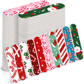 Lanties candy-cane nail file design offers quick, festive manicures at home.