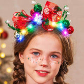 Latious light-up Christmas balls headband closeup with red bow and beads