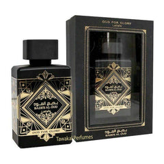 Lattafa Bade’e Al Oud Oud for Glory bottle front shows a luxe amber hue for evening wear.