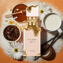Lattafa Eclaire heart notes white flowers honey – delicate floral sweetness.