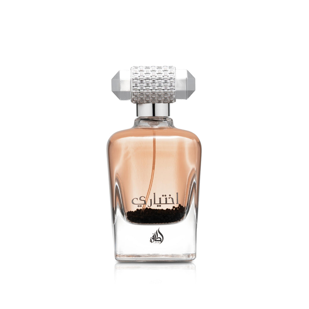 Lattafa Ekhtiari bottle-pour showcases creamy scent ideal for daytime elegance.