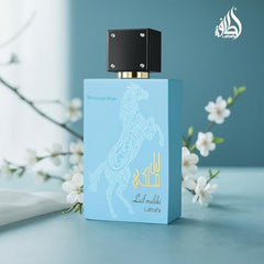 Lattafa Lail Maleki Moroccan Blue spray on wrist for long-lasting wear.