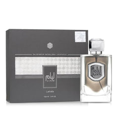 Lattafa Liam Grey angled bottle shot highlights opulent spice and creamy woods.