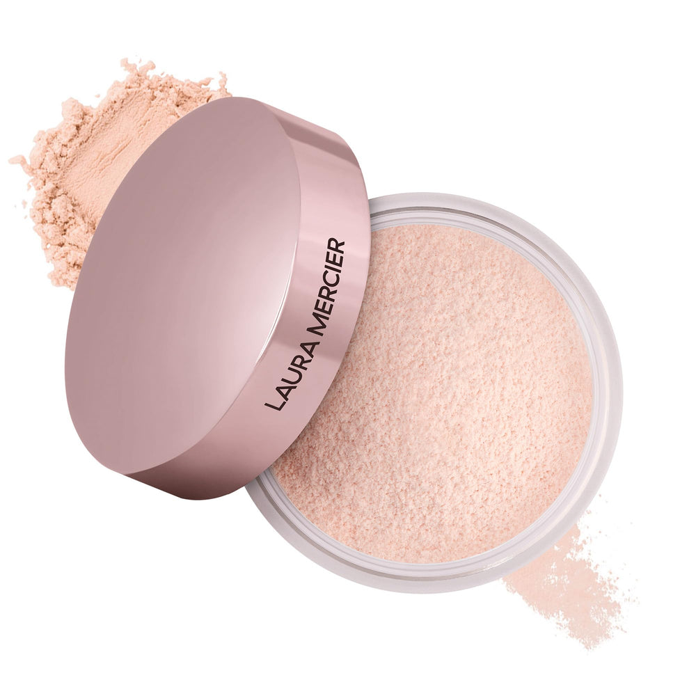 Laura Mercier Tone-Up Rose compact close-up shows brightening peachy pink pigments.
