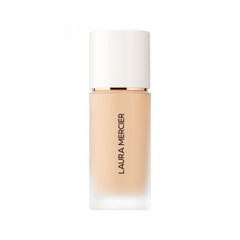 Laura Mercier Real Flawless foundation bottle closeup showing weightless coverage for natural skin