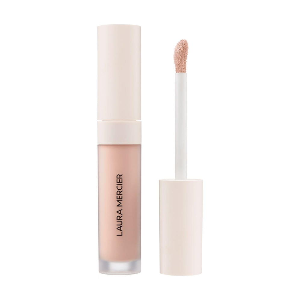 Laura Mercier Real Flawless serum concealer packaging closeup for quick on-the-go coverage.