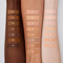 Laura Mercier Real Flawless serum concealer under-eye application demonstrating brightening and smoothing.