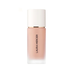 Laura Mercier Real Flawless Weightless Foundation soft-sand bottle showing shade match and packaging