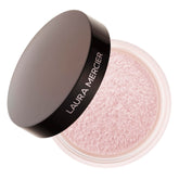 Laura Mercier Secret Brightening Under-Eye Setting Powder packaging, compact for quick brightening touch-ups.
