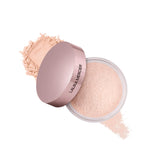 Laura Mercier translucent loose setting powder jar for long-wear, soft matte finish.
