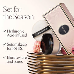 Laura Mercier powder on skin delivering matte soft-focus finish and shine control throughout the day.