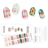 Lavinda Christmas nail strips pink plaid on nails with holiday sparkle