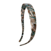 LAYONGMOLI blue marble acetate headband close-up showing rich pattern and long-lasting luster.