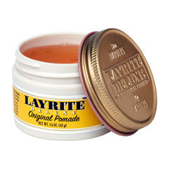 Layrite Original Pomade hands applying demonstrates controllable hold for versatile looks