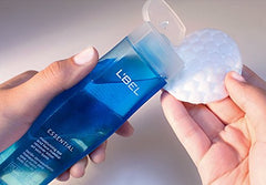 L'Bel Essential remover on a soft pad for eye and face cleansing