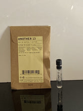 Le Labo AnOther 13 dabber sample bottle shows compact, travel-friendly fragrance for on-the-go use.