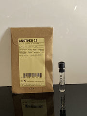 Le Labo AnOther 13 dabber sample bottle shows compact, travel-friendly fragrance for on-the-go use.