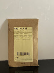 Le Labo AnOther 13 dabber sample cap closeup highlights premium build and portability.