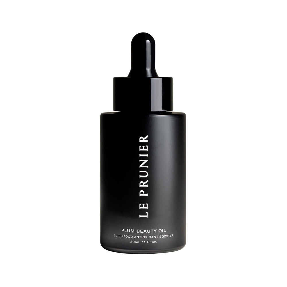 Le Prunier Plum Beauty Oil bottle pour for weightless skin hydration.