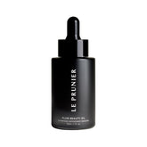 Le Prunier Plum Beauty Oil bottle pour for weightless skin hydration.
