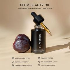 Le Prunier Plum Beauty Oil texture close-up highlights fast-absorbing formula.