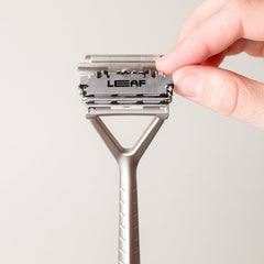 Leaf Shave recycling tin demonstrates easy, eco-friendly disposal after use.