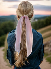 LFOUVRE scarf scrunchie worn on a bun shows versatile styling and secure hold