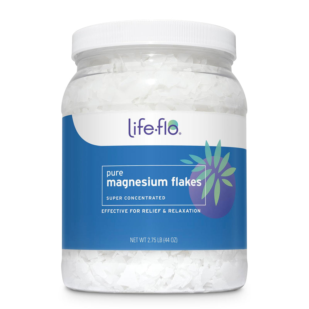 LIFE-FLO Pure Magnesium Bath Flakes in a tub for a spa-like soak at home.