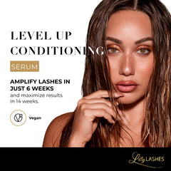 Lilly Lashes Level Up wand applying serum along lash line for nightly conditioning