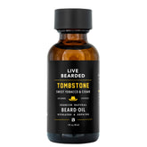 Live Bearded Tombstone scent bottle shows premium jojoba for hydrated beard and skin.