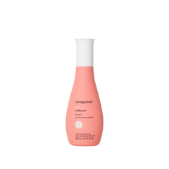 Living Proof Curl Enhancer bottle demonstrates lightweight conditioning for defined waves