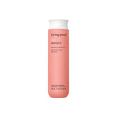 Living Proof Curl Shampoo bottle front showing defined curls after a gentle cleanse