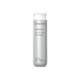 Living Proof Full Conditioner bottle pour shows volume-boosting, silicone-free care.