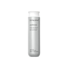 Living Proof Full Conditioner bottle pour shows volume-boosting, silicone-free care.