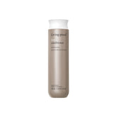 Living proof No Frizz Conditioner bottle showcases frizz control and sleek, smooth results.