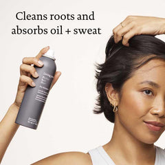 Living Proof Perfect Hair Day Dry Shampoo time-release scent on hair for all-day freshness.