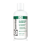 LOCssentials Clarifying Shampoo bottle with peppermint and tea tree oils for refreshed locs.