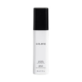 LolaVie Glossing Detangler bottle demonstrates all-in-one detangling and heat protection.