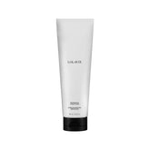 LolaVie Restorative Conditioner bottle closeup shows hydrating bond-building formula for healthier hair