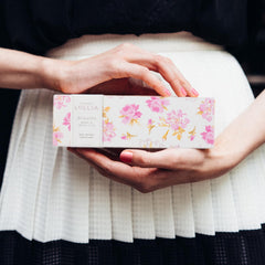 LOLLIA Breath Peony and White Lily scent conveys a fresh floral hand-care moment.