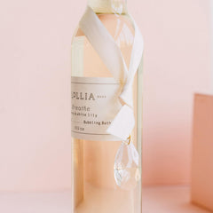 Lollia Breathe crystal accent and satin packaging elevate bath time aesthetics