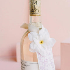 Lollia Relax Bubble Bath ingredients display highlighting avocado oil and vitamin E