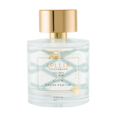 LOLLIA Wish eau de parfum bottle with amber glow for luxurious everyday fragrance rituals.