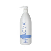 Loma Calming Crème bottle-front for quick frizz control