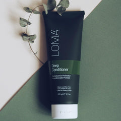 LOMA Deep Conditioner application on damp hair for deep conditioning.