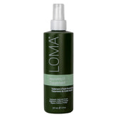 Loma Nourishing Oil Treatment bottle for sleek shine and thermal protection.
