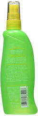 L'Oreal Kids Pear Tangle Tamer spray-action demonstrates gentle conditioning for knot-prone hair without tears.