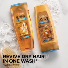 L'Oreal Paris Elvive Extraordinary Oil Conditioner application smoothing for manageable hair