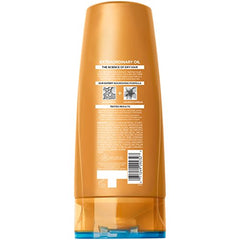 Closeup of L'Oreal Paris Elvive Extraordinary Oil blend highlighting lightweight oils for nourishment